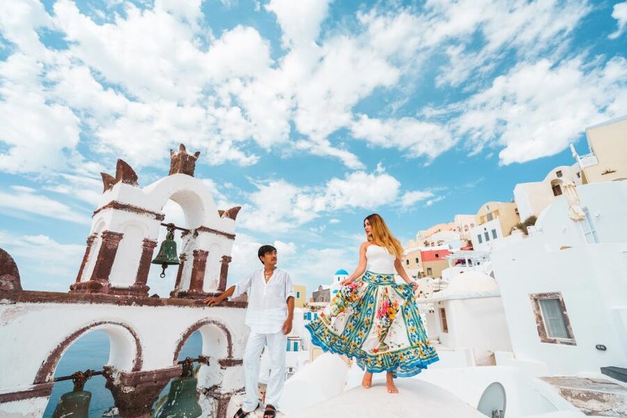 Tour Santorini with a Professional Photographer - Imerovigli stop: white churches, blue-domed shapes, and calmer vibes